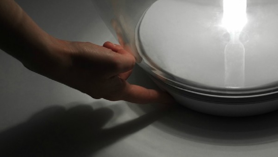 Artemide Empatia, tavolo. Dettaglio accensione.